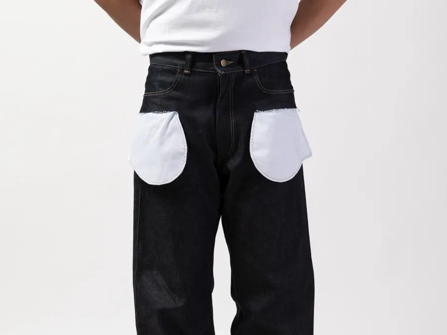 Jeans fit image showing exposed pocket bag placement, rise and leg proportion