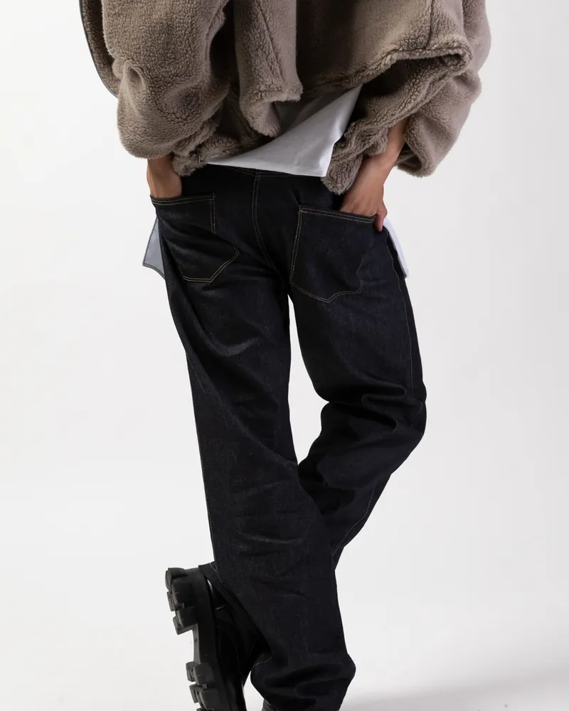 Physical jeans back photo showing pocket placement and yoke shape reference