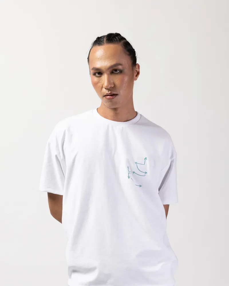 Physical tee front photo used as a print placement reference